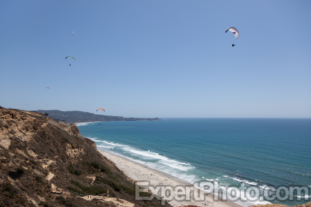 Nice photo of Paragliders over Torrey Pines